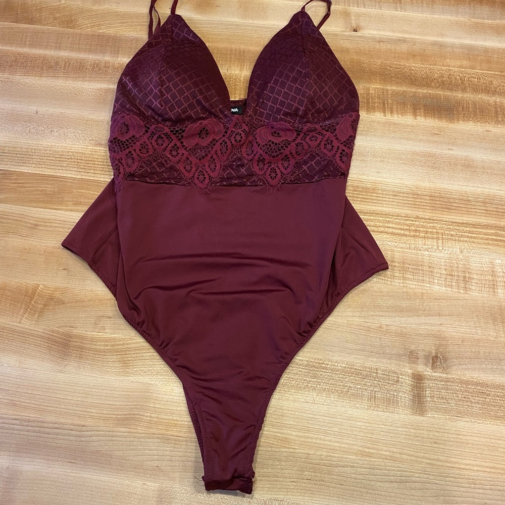 Women’s maroon body piece with lace